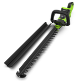 A cordless hedge trimmer with a bright green and black handle, shown alongside two long black blade guard covers on a clean white background. The brand name 'POWERALL' is visible on the handle.